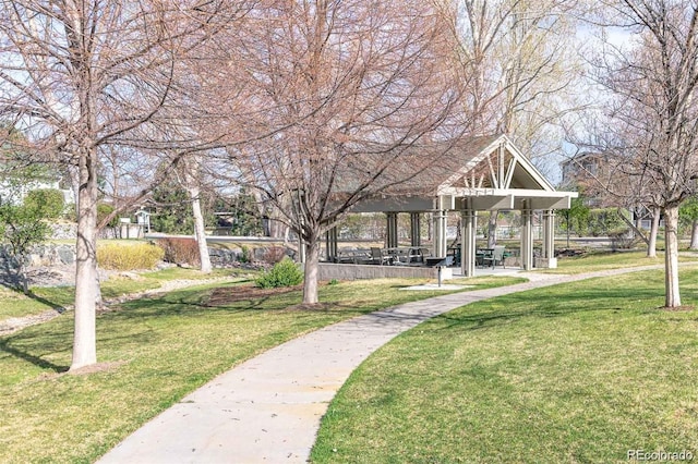 view of home's community with a gazebo and a lawn