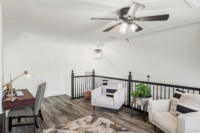 office with ceiling fan, baseboards, and wood finished floors