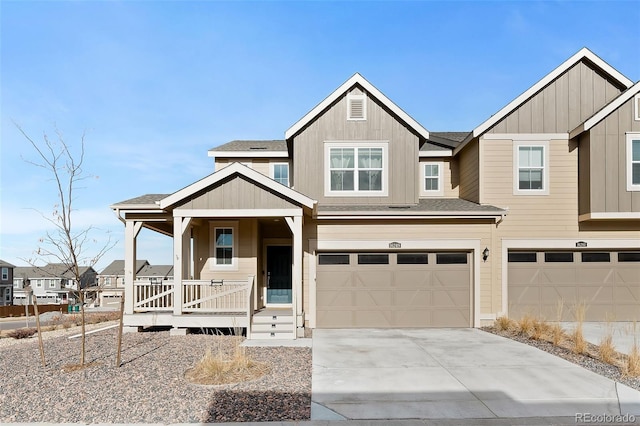 view of front of property featuring a porch and a garage