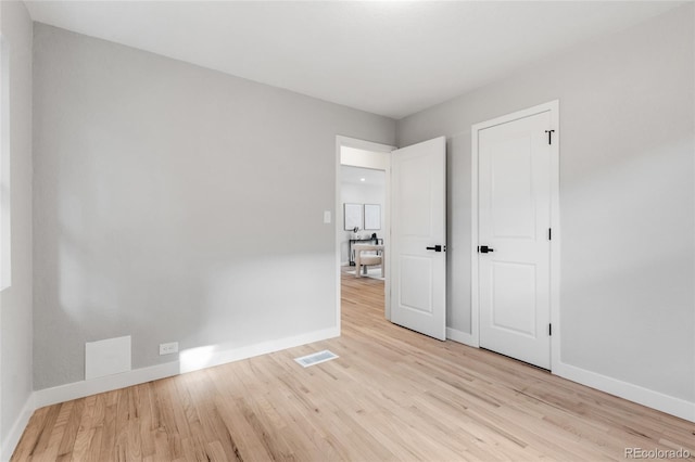 unfurnished bedroom featuring light hardwood / wood-style flooring