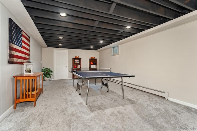 27436 Kennedy Gulch Rd, Conifer, CO 80433 - rec room with carpet floors, a baseboard heating unit, and recessed lighting