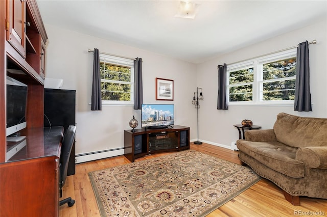 27436 Kennedy Gulch Rd, Conifer, CO 80433 - office with plenty of natural light, light wood-type flooring, and baseboard heating