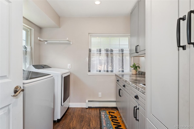 27436 Kennedy Gulch Rd, Conifer, CO 80433 - washroom with a baseboard radiator, washing machine and dryer, cabinet space, dark wood-style flooring, and recessed lighting