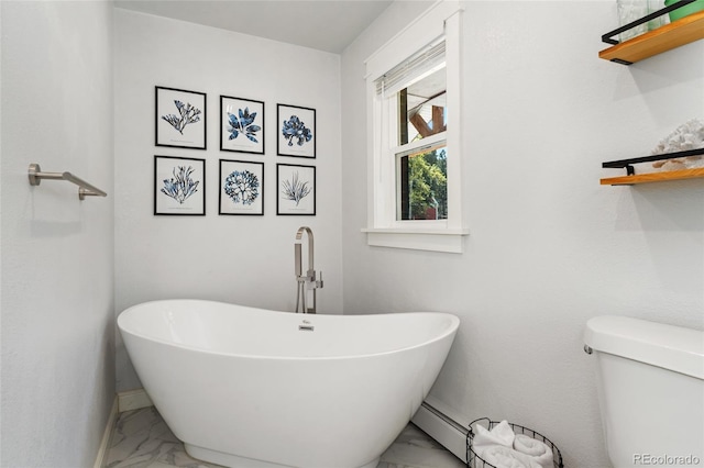 27436 Kennedy Gulch Rd, Conifer, CO 80433 - full bathroom featuring marble finish floors, a freestanding tub, and a baseboard heating unit