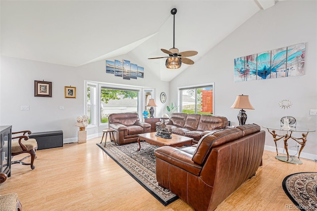 401 N Columbine St, Golden, CO 80403 - living room featuring light wood-type flooring, high vaulted ceiling, baseboards, and a ceiling fan