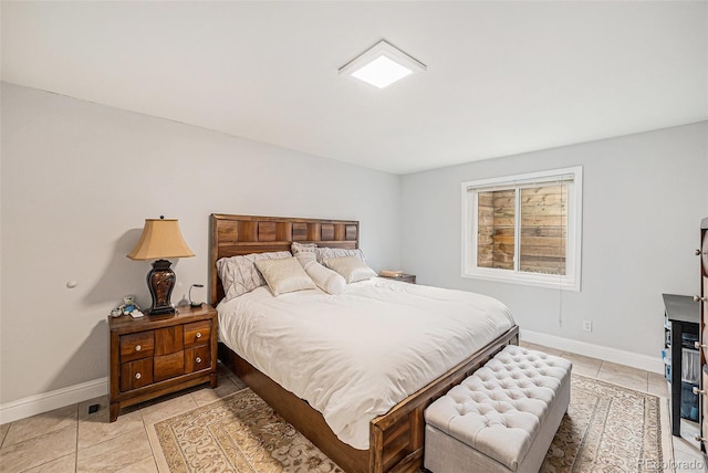 401 N Columbine St, Golden, CO 80403 - bedroom featuring baseboards and light tile patterned floors