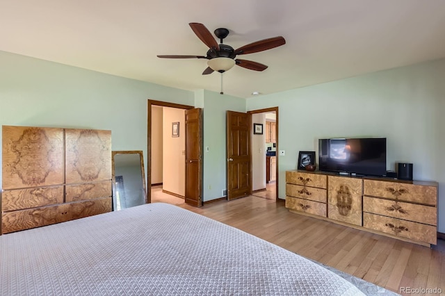 6663 S Prescott Way, Littleton, CO 80120 - bedroom featuring wood finished floors, ceiling fan, and baseboards