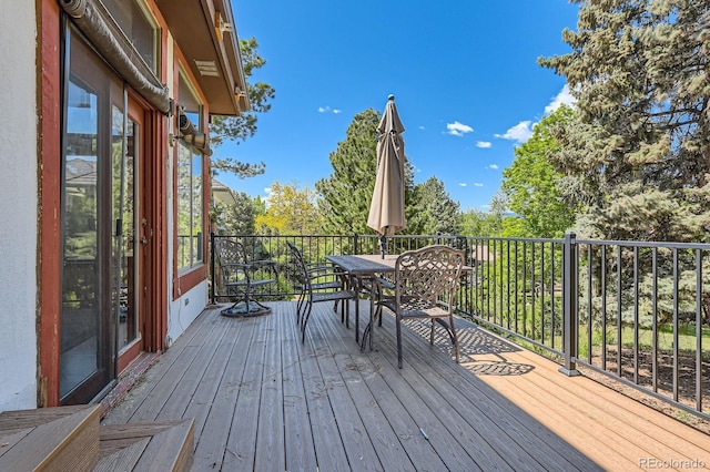 6663 S Prescott Way, Littleton, CO 80120 - wooden deck with outdoor dining area
