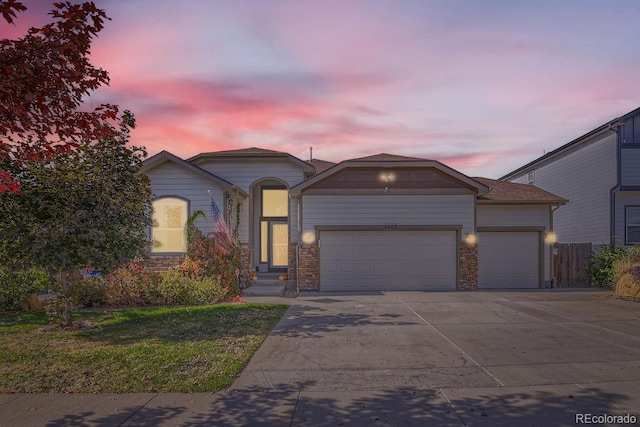 single story home with a garage