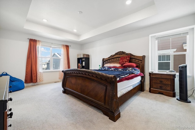 10983 Uvalda St, Commerce City, CO 80022 - bedroom with light carpet, a raised ceiling, recessed lighting, and baseboards