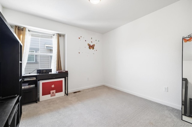 10983 Uvalda St, Commerce City, CO 80022 - unfurnished office featuring light carpet and baseboards