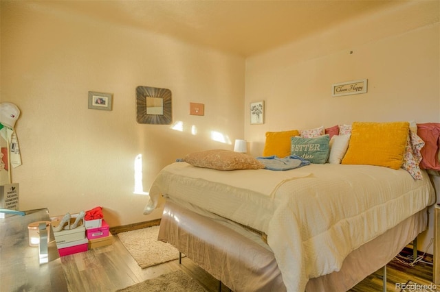 bedroom featuring hardwood / wood-style flooring