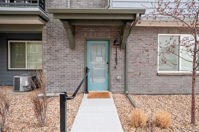 12283 W 57th Ln, Arvada, CO 80002 - doorway to property with brick siding