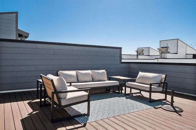 12283 W 57th Ln, Arvada, CO 80002 - deck featuring an outdoor hangout area