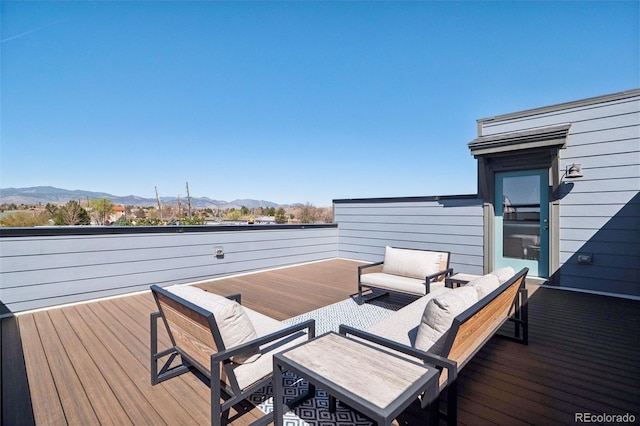 12283 W 57th Ln, Arvada, CO 80002 - wooden terrace featuring a mountain view and outdoor lounge area