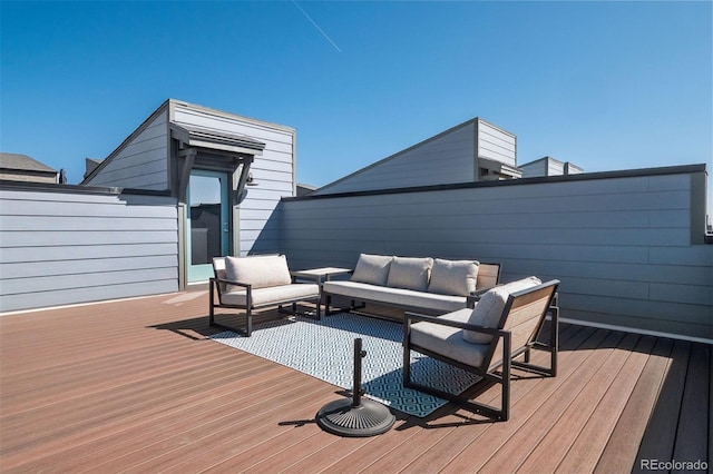 12283 W 57th Ln, Arvada, CO 80002 - wooden deck featuring an outdoor hangout area