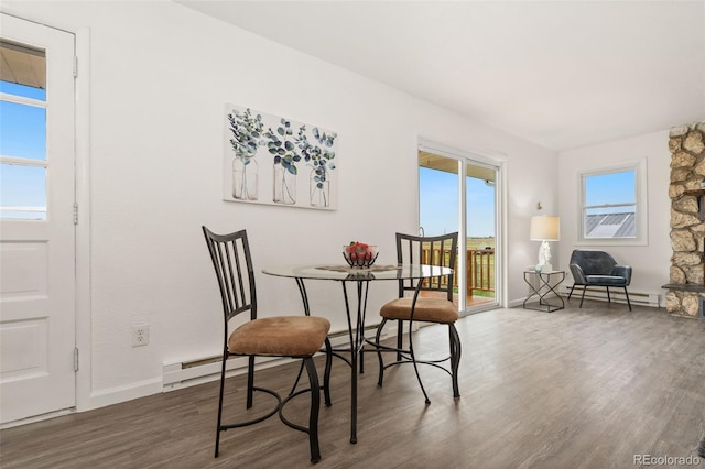 14475 Lanewood St, Brighton, CO 80603 - dining area featuring wood finished floors and baseboards