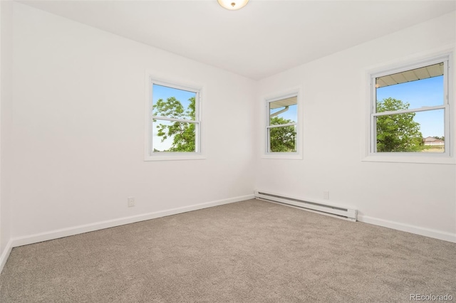 14475 Lanewood St, Brighton, CO 80603 - empty room with a baseboard heating unit and carpet