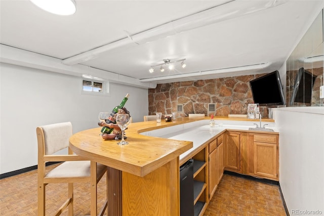 14475 Lanewood St, Brighton, CO 80603 - kitchen featuring a sink and open shelves