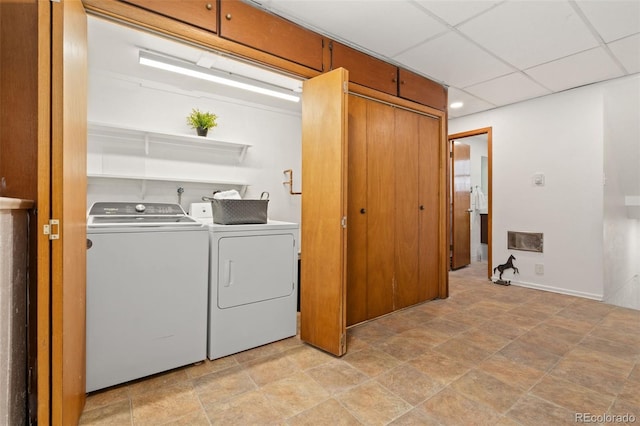 14475 Lanewood St, Brighton, CO 80603 - washroom featuring washing machine and dryer and stone finish floors