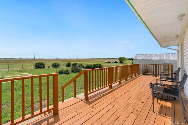 14475 Lanewood St, Brighton, CO 80603 - wooden deck featuring a yard and a view of countryside