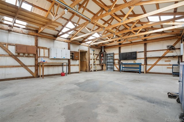 14475 Lanewood St, Brighton, CO 80603 - garage featuring a workshop area