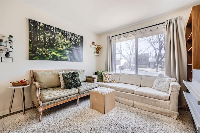 living room featuring baseboards