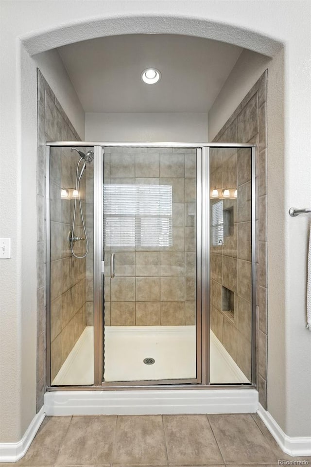 10368 Bluffmont Dr, Lone Tree, CO 80124 - bathroom featuring a shower stall, tile patterned floors, and recessed lighting