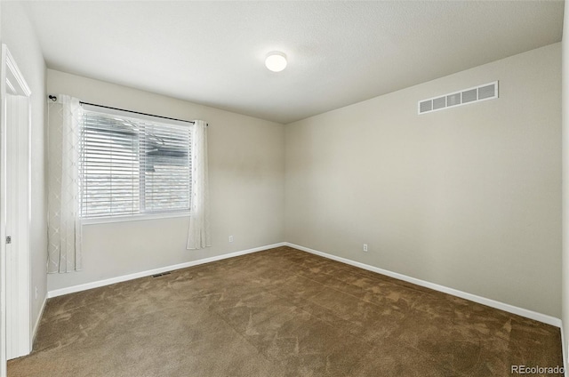 10368 Bluffmont Dr, Lone Tree, CO 80124 - carpeted empty room featuring baseboards