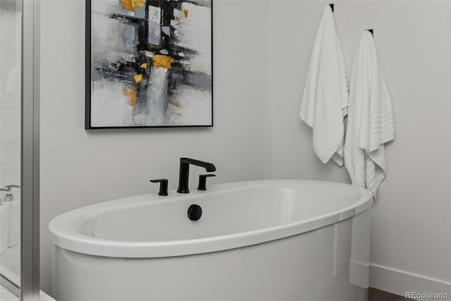 11187 W 53rd Dr, Wheat Ridge, CO 80033 - bathroom with a freestanding bath