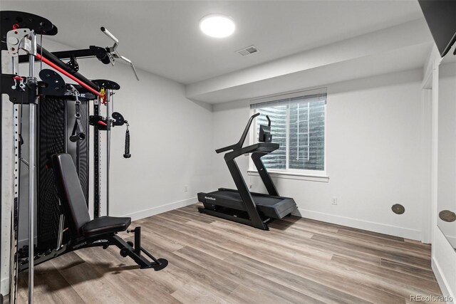 11187 W 53rd Dr, Wheat Ridge, CO 80033 - exercise room featuring wood finished floors and baseboards