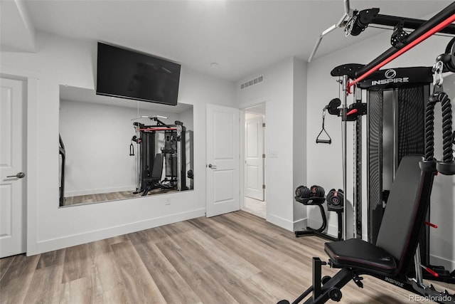 11187 W 53rd Dr, Wheat Ridge, CO 80033 - exercise room featuring wood finished floors and baseboards