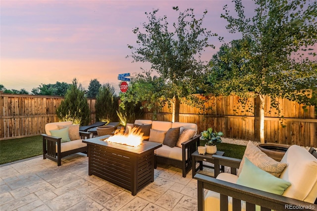 11187 W 53rd Dr, Wheat Ridge, CO 80033 - fenced backyard with an outdoor living space with a fire pit and a patio area