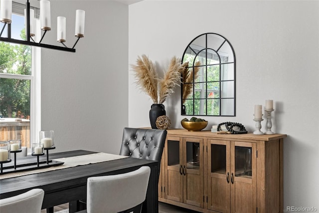 11187 W 53rd Dr, Wheat Ridge, CO 80033 - dining space with plenty of natural light and a chandelier