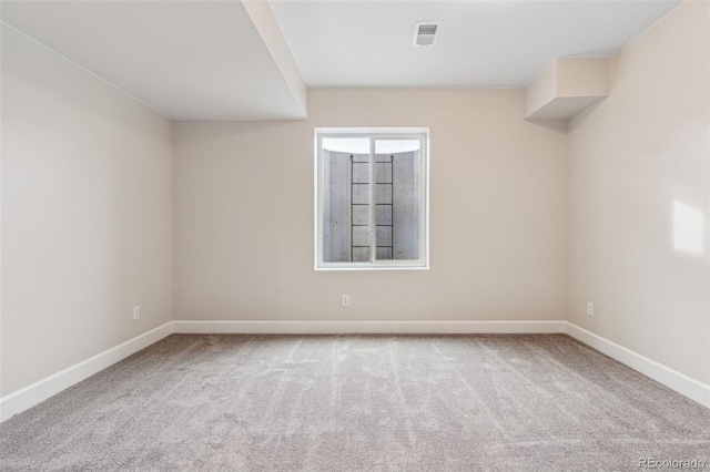 view of carpeted spare room