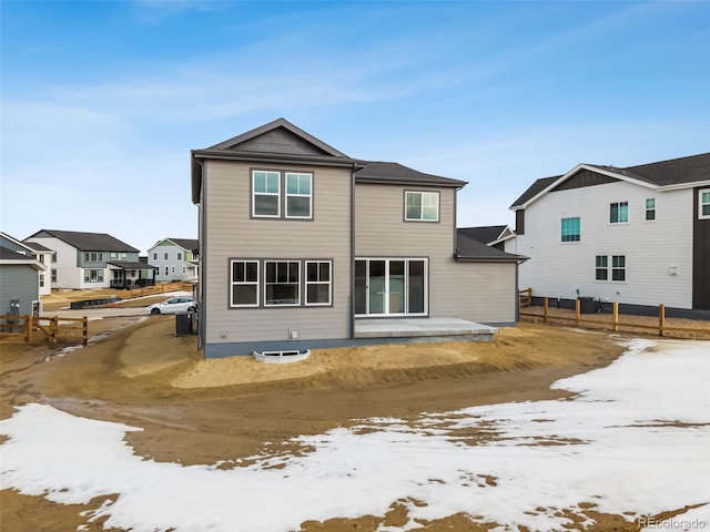 view of snow covered house