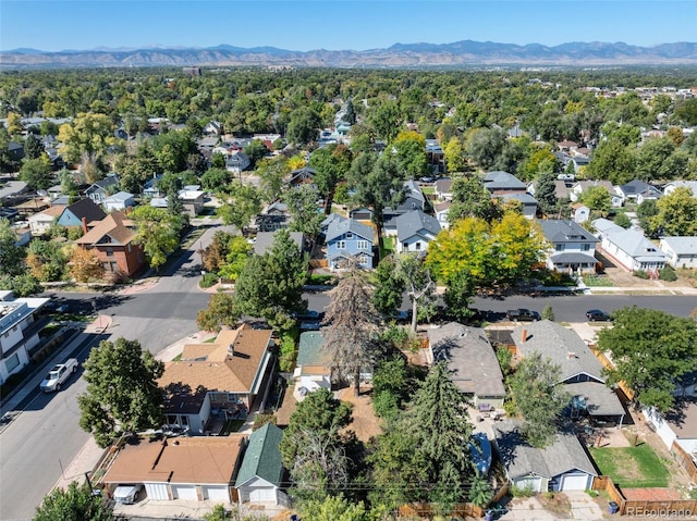 aerial overview of property's location with nearby suburban area and mountains
