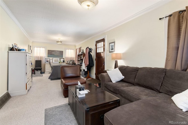 living area with plenty of natural light, crown molding, light colored carpet, and baseboards