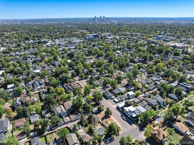 aerial overview of property's location with nearby suburban area