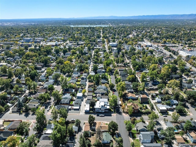 view of property location featuring a mountainous background and nearby suburban area