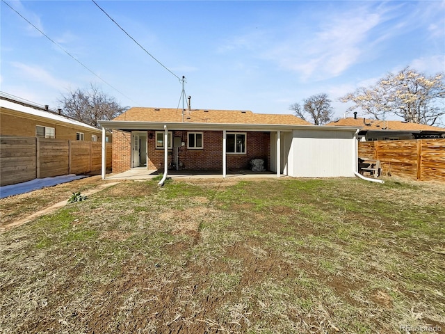 back of property featuring a patio area