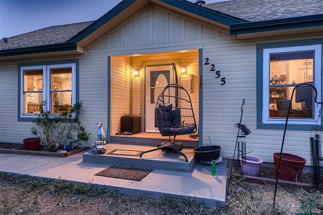 entrance to property with a patio