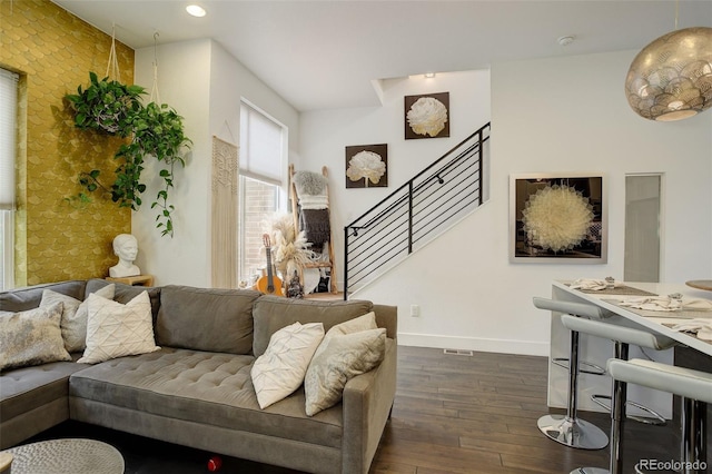3030 Wilson Ct Unit 5, Denver, CO 80205 - living area featuring an accent wall, dark wood finished floors, stairway, recessed lighting, and wallpapered walls