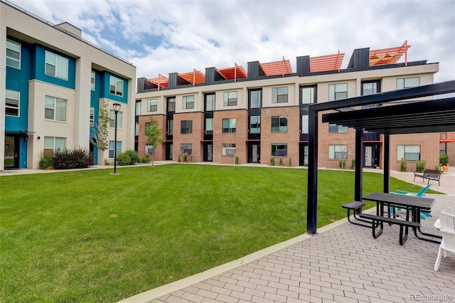 3030 Wilson Ct Unit 5, Denver, CO 80205 - surrounding community with a lawn