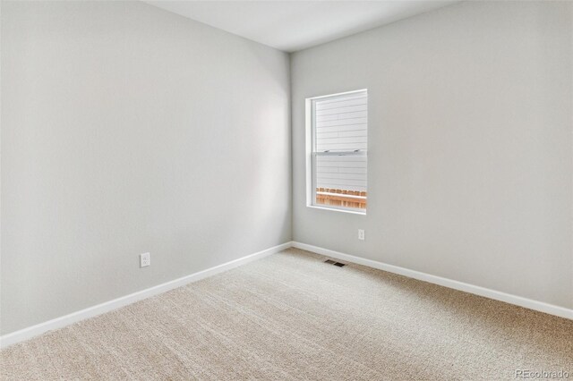 2171 Christina St, Fort Lupton, CO 80621 - empty room featuring light colored carpet and baseboards