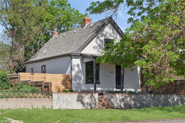 3817 Osage St, Denver, CO 80211 - view of front of house with stucco siding and a chimney