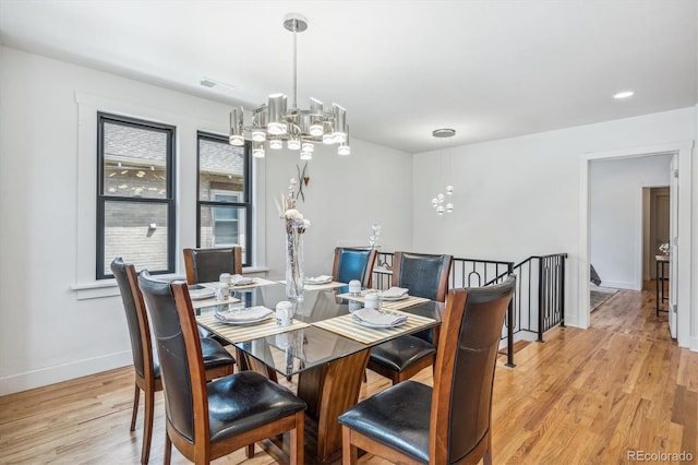 dining space featuring light hardwood / wood-style flooring