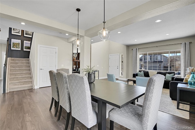 dining space with stairs, dark wood-type flooring, baseboards, and recessed lighting