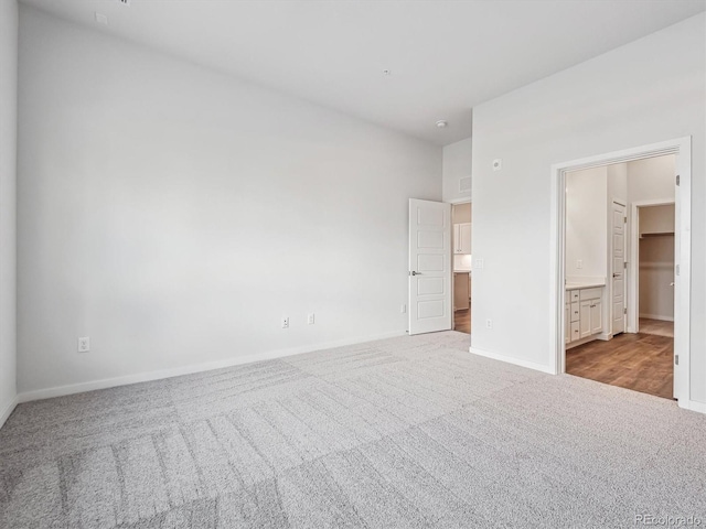 485 Interlocken Blvd Unit 101, Broomfield, CO 80021 - unfurnished bedroom with carpet floors and connected bathroom