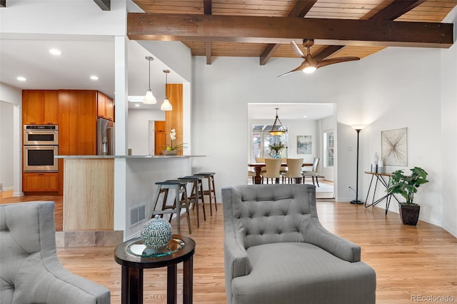 living room with visible vents, beamed ceiling, ceiling fan, recessed lighting, and light wood-style flooring